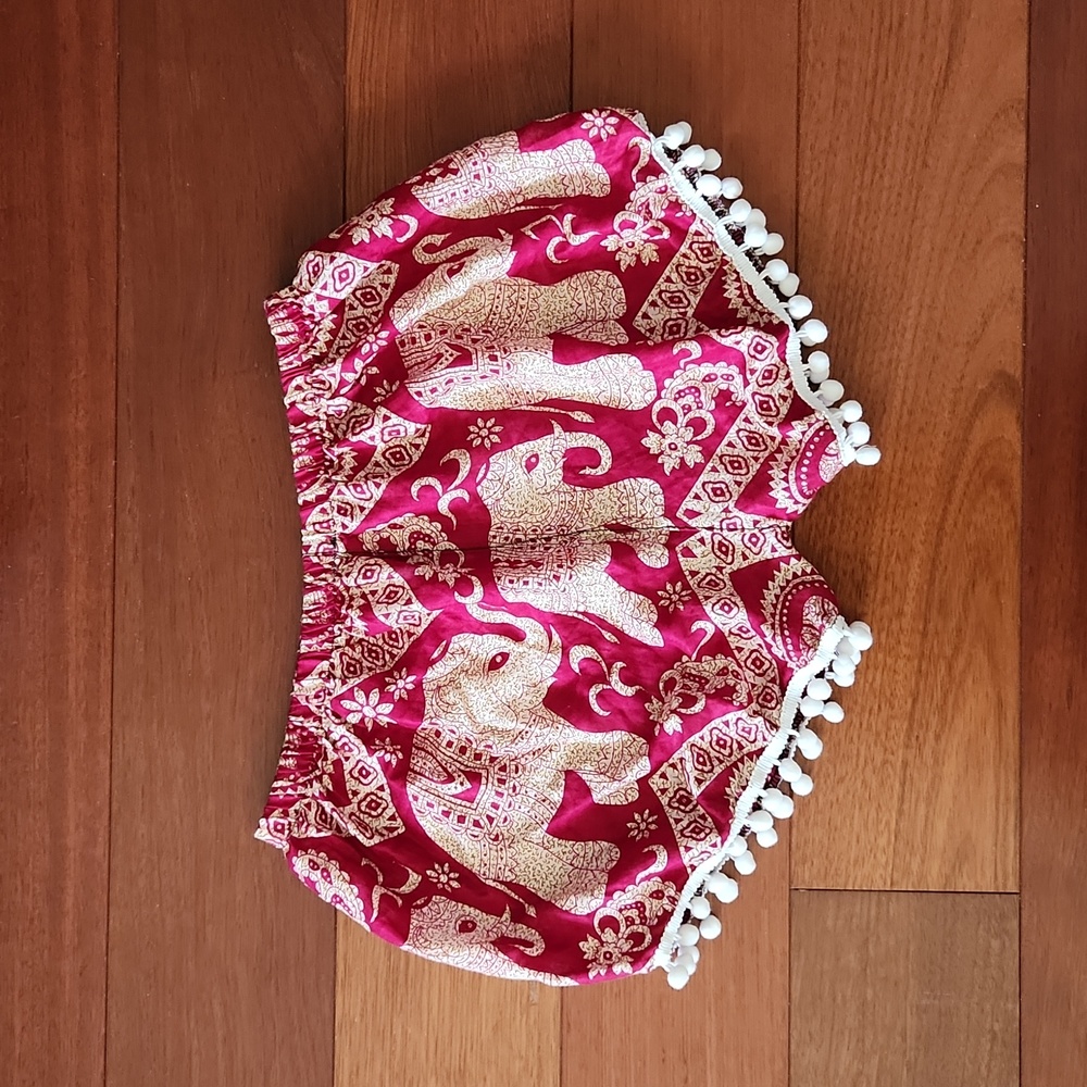 NWOT Red/cream elephant shorts with pom-pom hems. Size S.